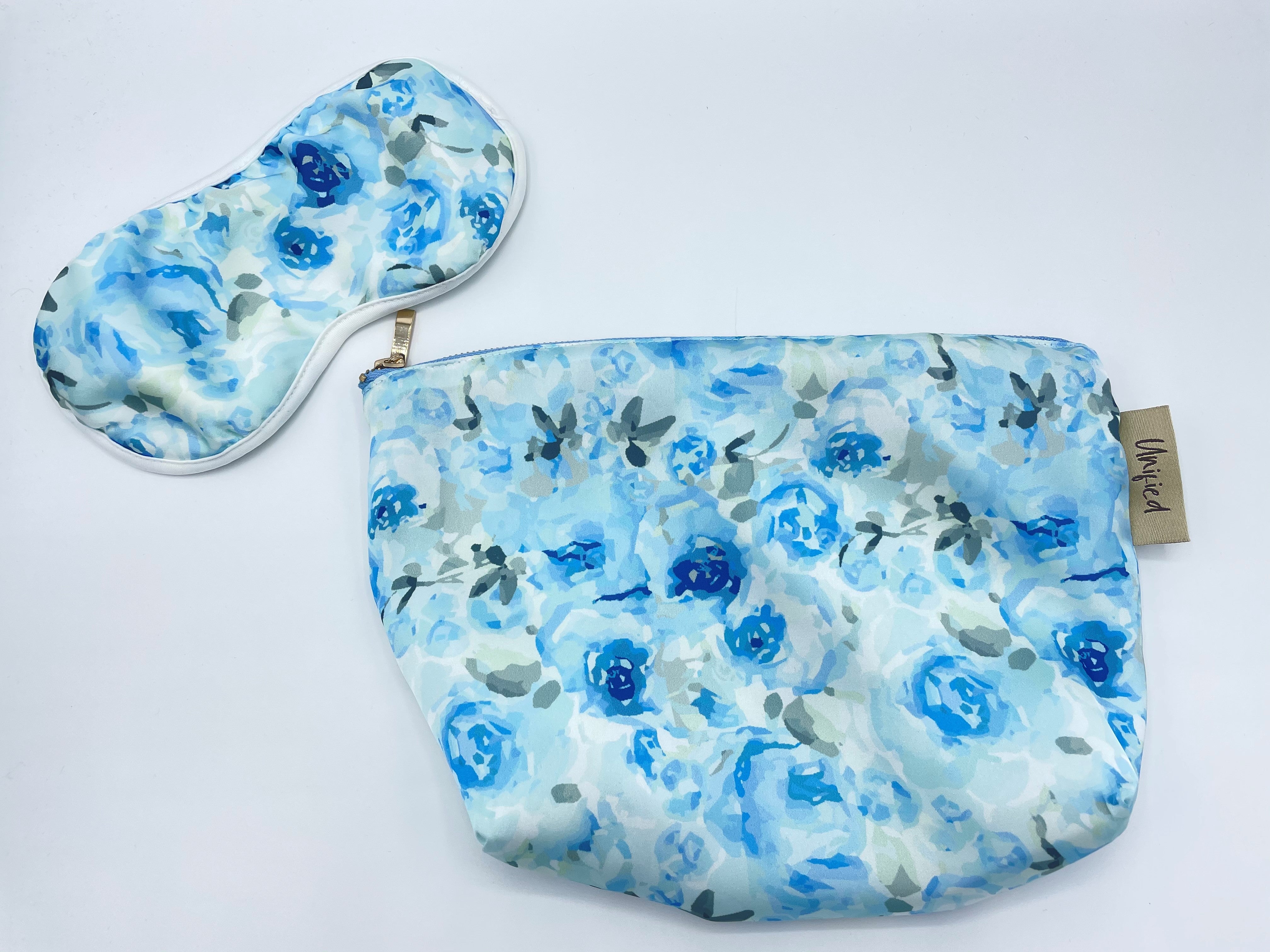 Blue floral eye mask and travel bag accessories set