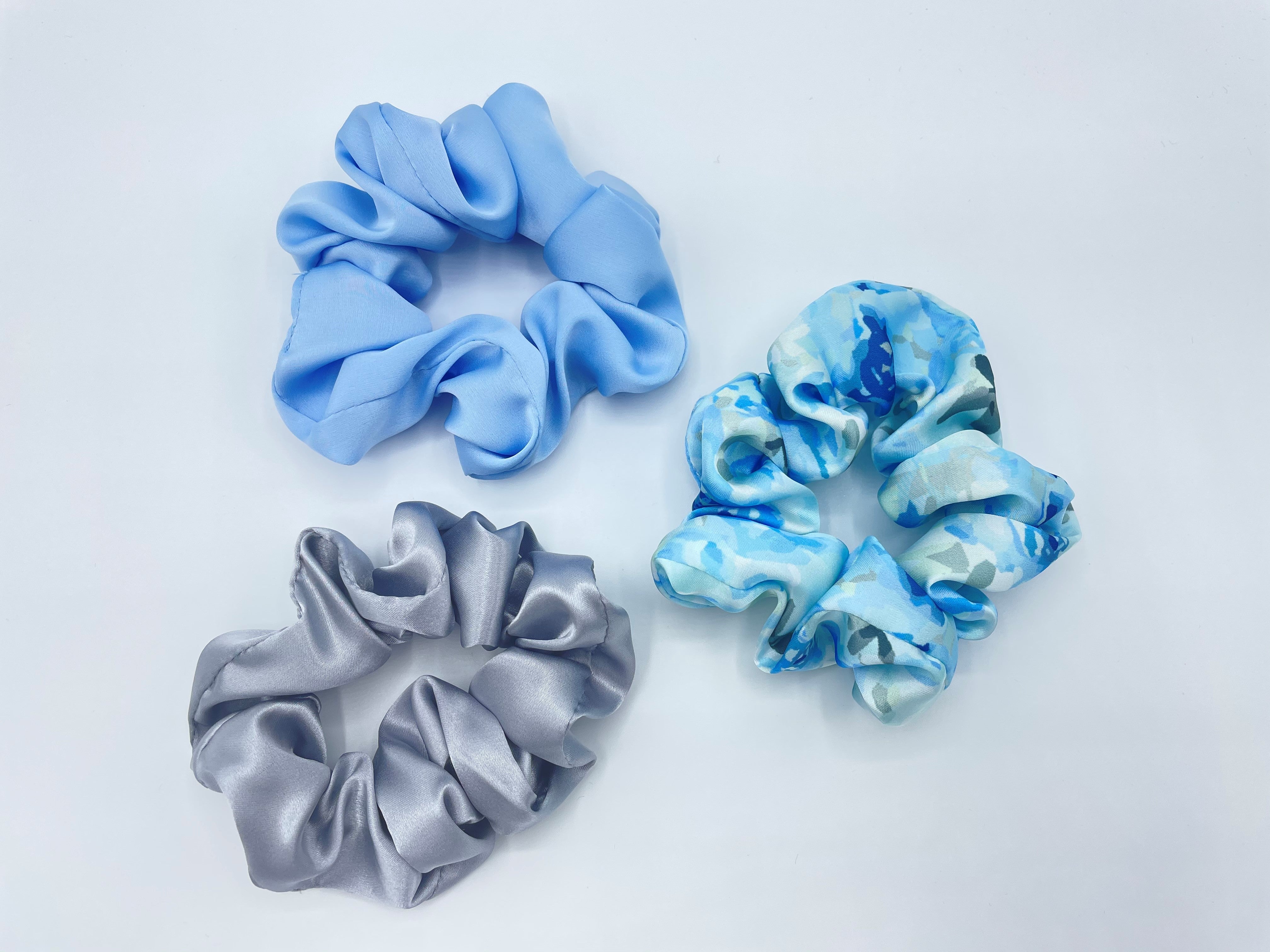 Set of three blue and silver hair scrunchies, made from recycled plastic bottles