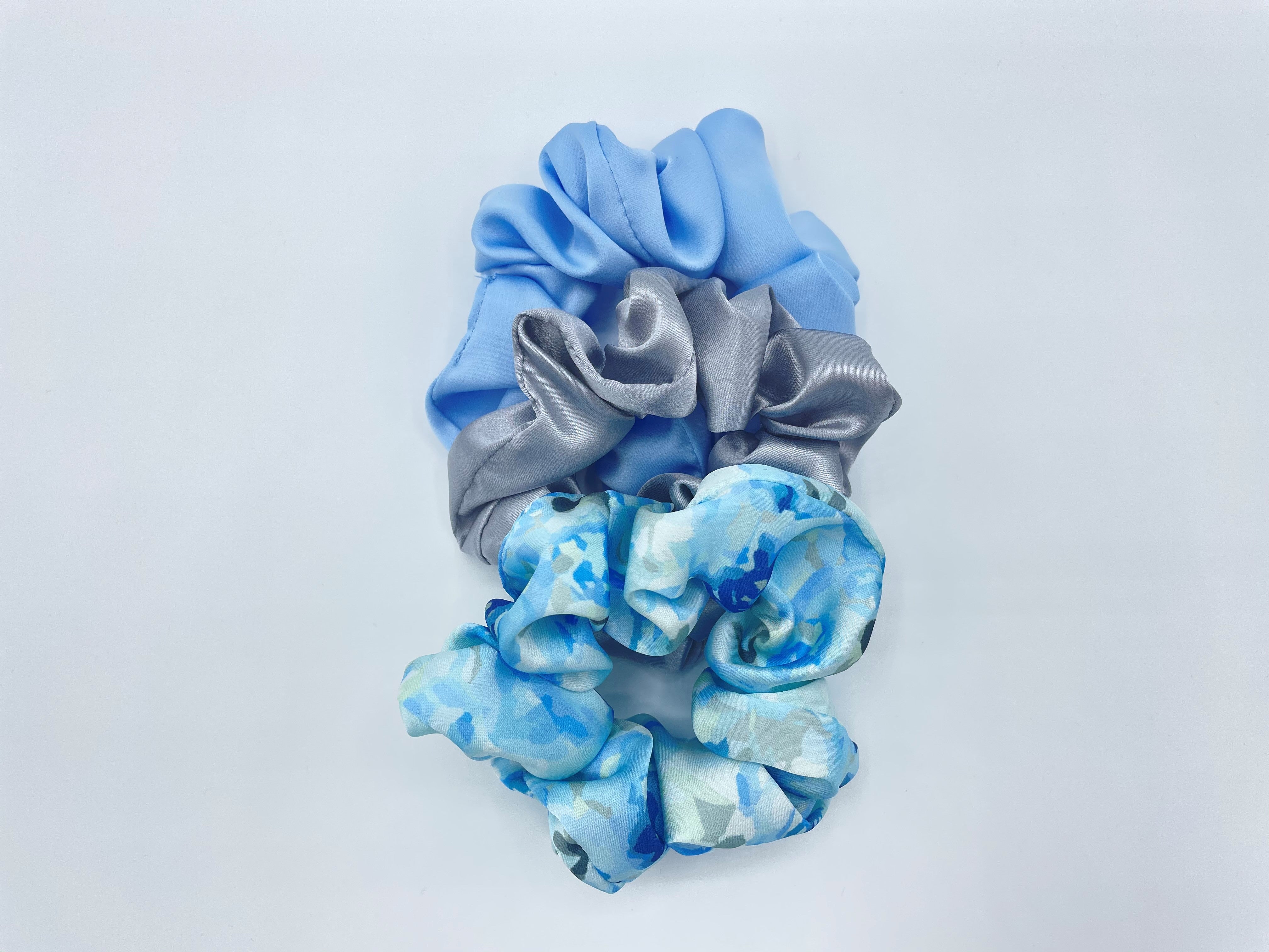 Set of three blue and silver hair scrunchies, made from recycled plastic bottles