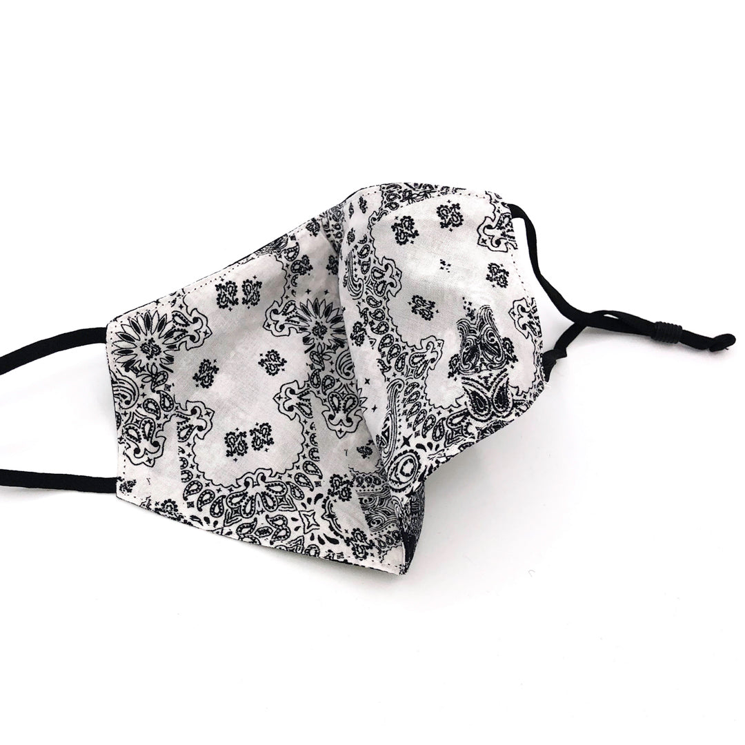 Reversible face mask with a bandana print by Unified UK