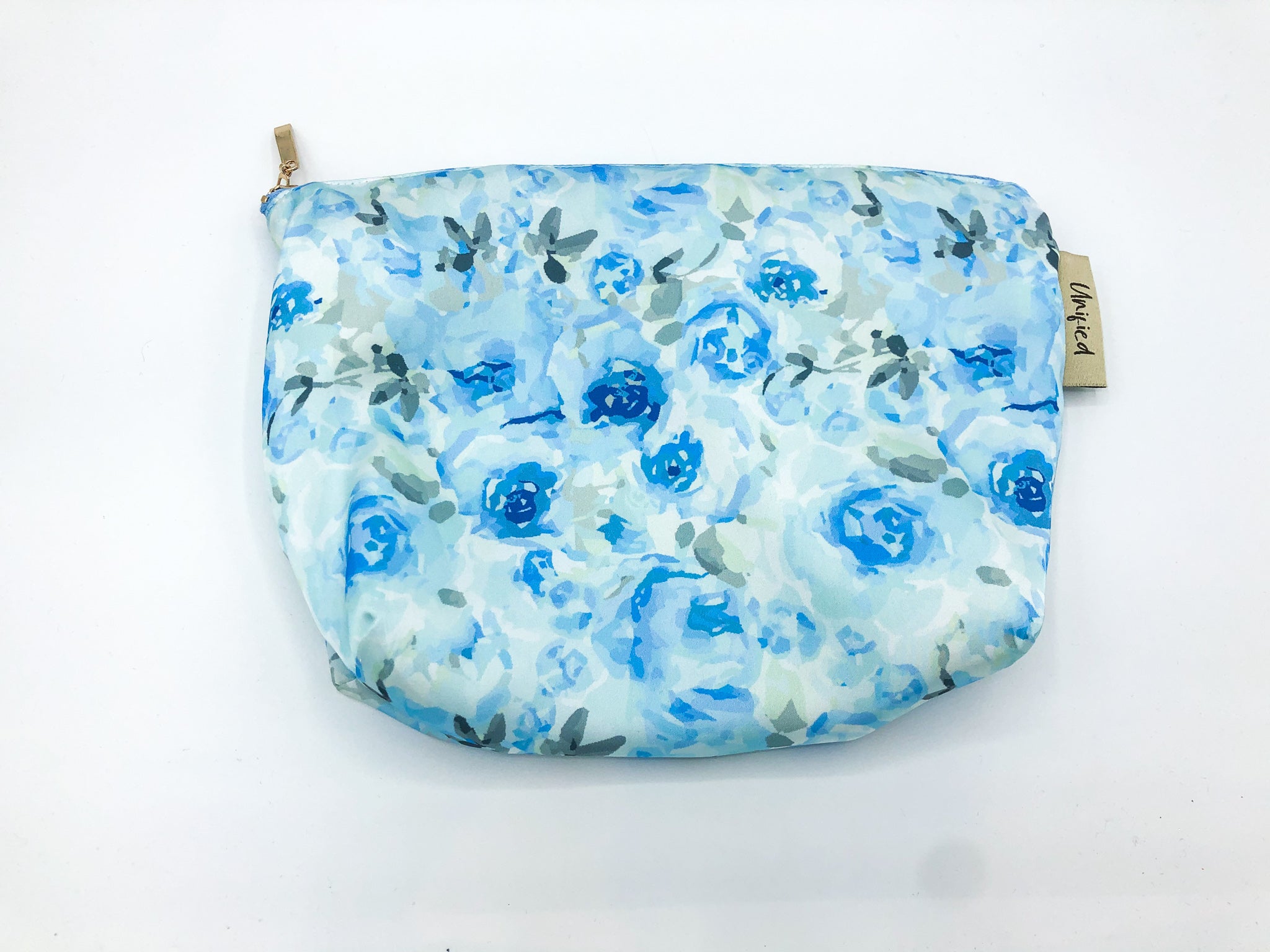 Blue floral travel and make up bag made from recycled plastic