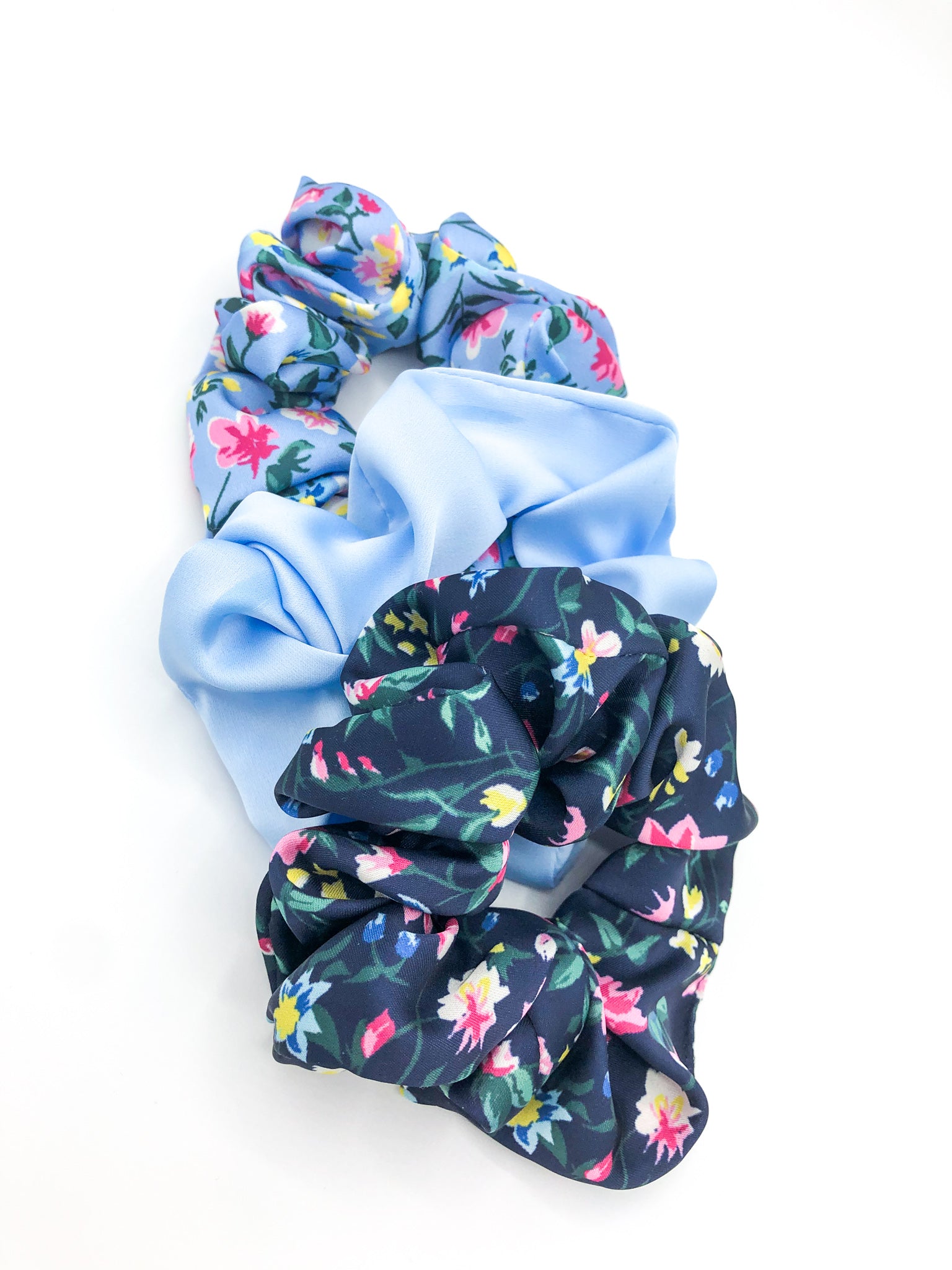 Set of three blue floral hair scrunchies