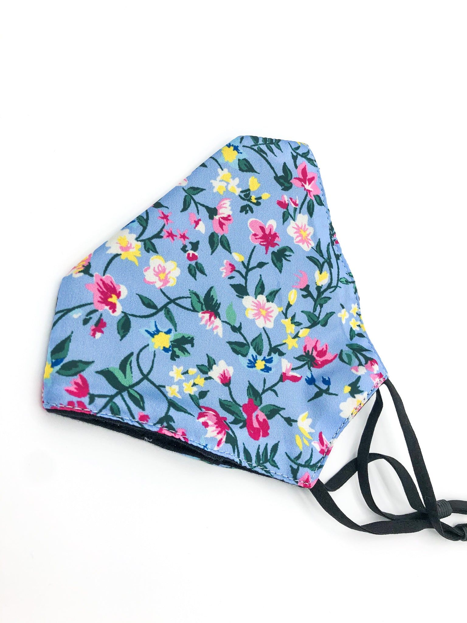 Blue floral face covering with adjustable straps, nose wire by Unified UK